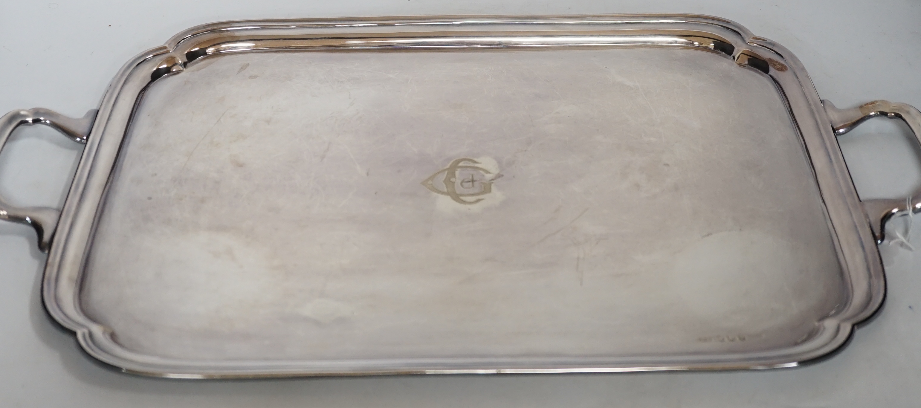 An Elizabeth II silver two handled tea tray, by Viners Ltd, Sheffield, 1966, 56.2cm over handles, 63.7oz.